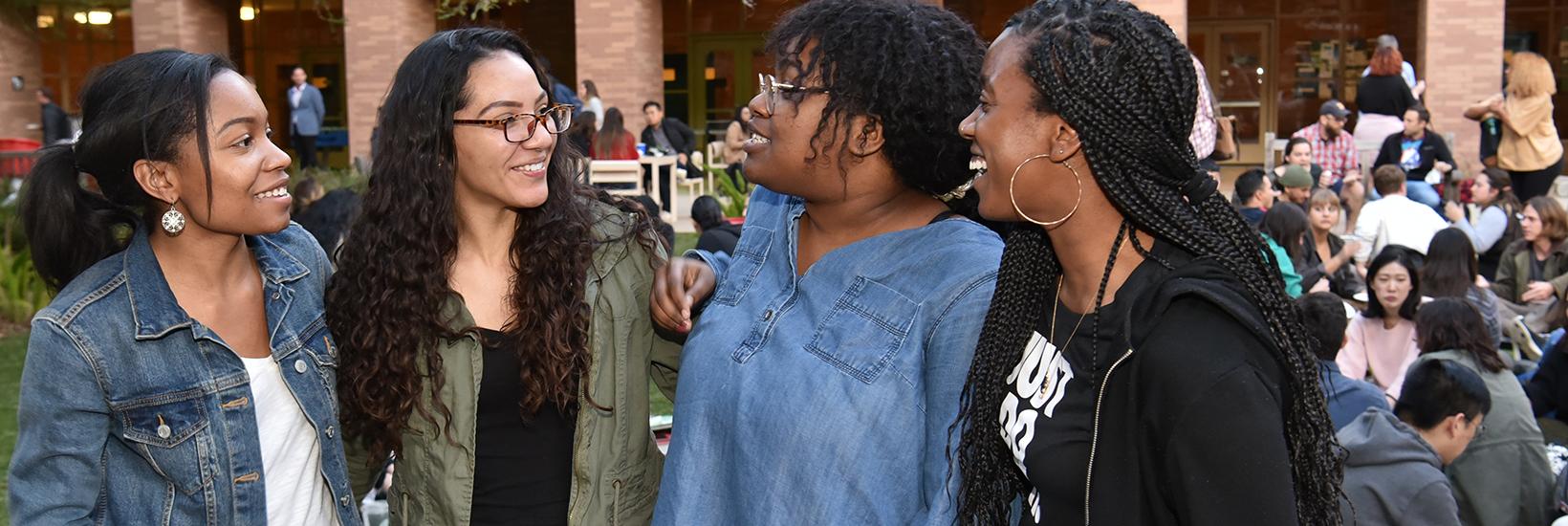 diverse group of ucla law students engaging